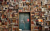 Door into a wall of books